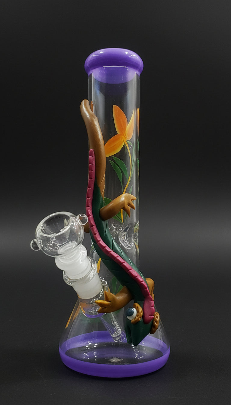 10 inch aesthetic glass bong handcradted with reptile, that is lizard with design of yellow flower patterns on the heavy duty boroscil glass bong, smoking water pipe in black bg for more clear distinct designs visibility, purple rings on top and bottom