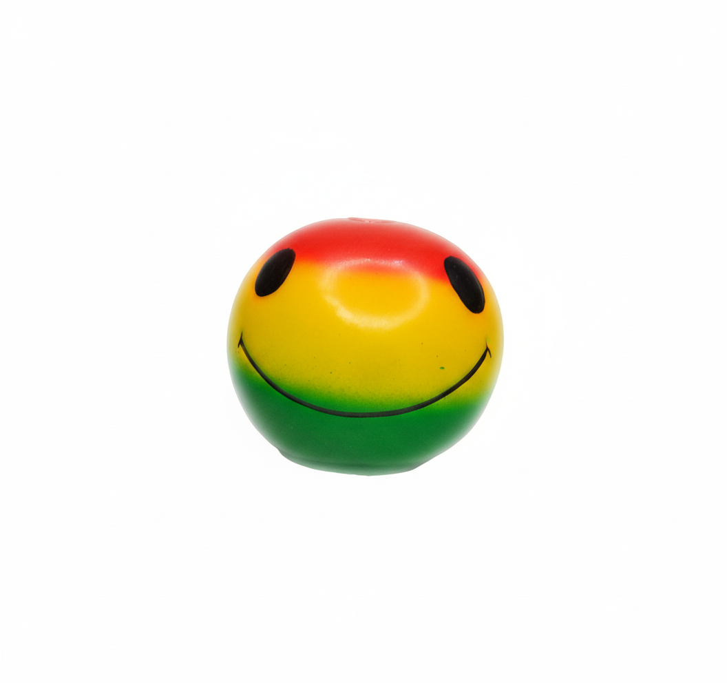 Close-up rasta smiley face ceramic bong showing red yellow green gradient design