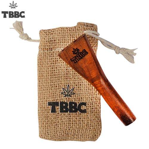TBBC Double Barrel J Holder made of wood, displayed in a burlap sack with the TBBC logo printed on it.handcrafted wooden joint holder made by tbbc especially for homies who want to smoke 2 joints in 1, get highly fried/baked with double barrel and have real fun while taking cool and smooth toke every time you smoke. Weed lovers gets mad when they see this Magical toy in your hand.