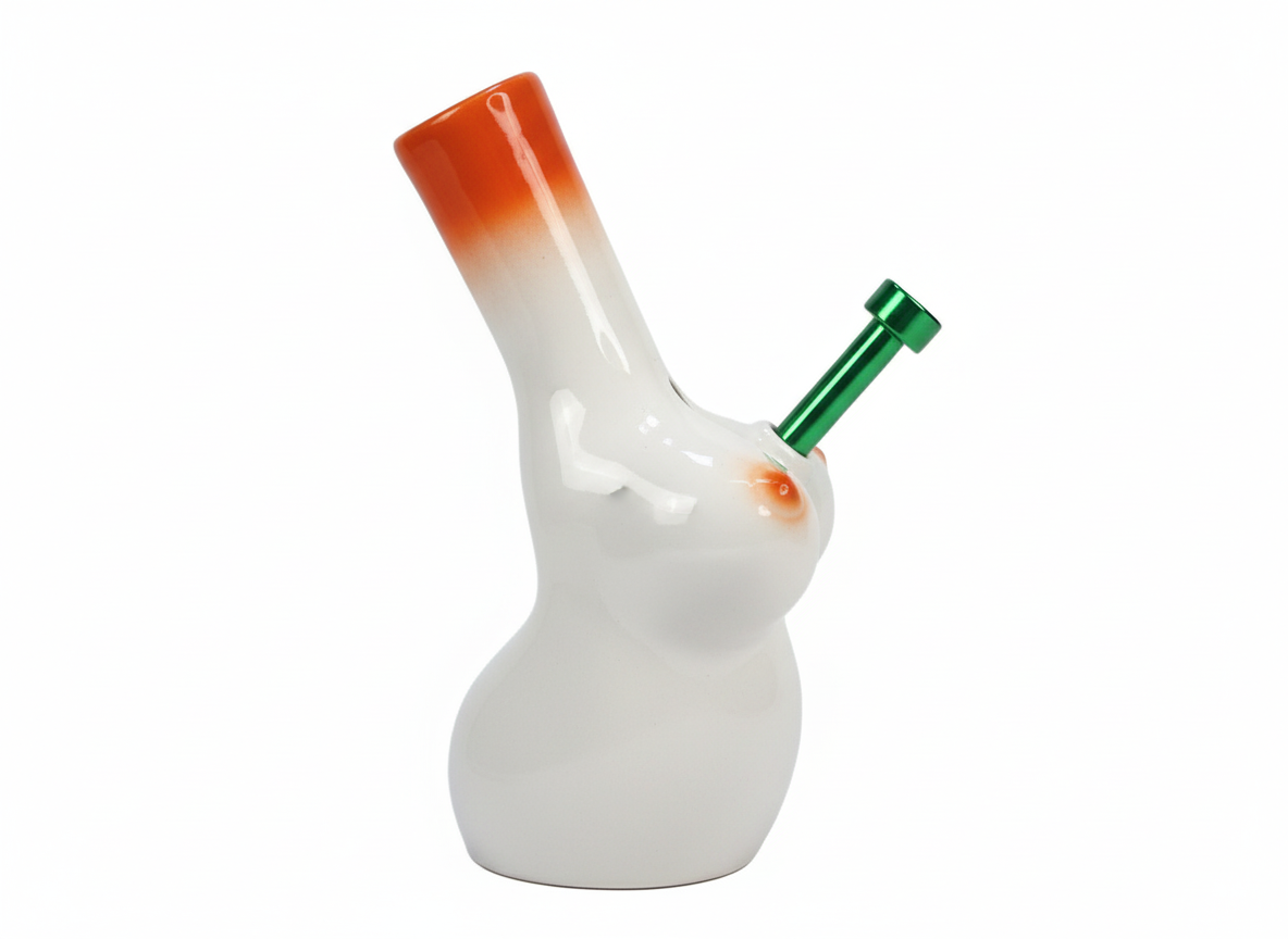 White ceramic smoking accessory with orange top and green accent on a white background, White boobs nude erotic bong with orange top on a white background,sunset water pipe for stoners hippie trippy psyedeluc 420 &  710 accessories essentials, 
goddess bong ceramic water pipe, ganja girls marijuana maryjane