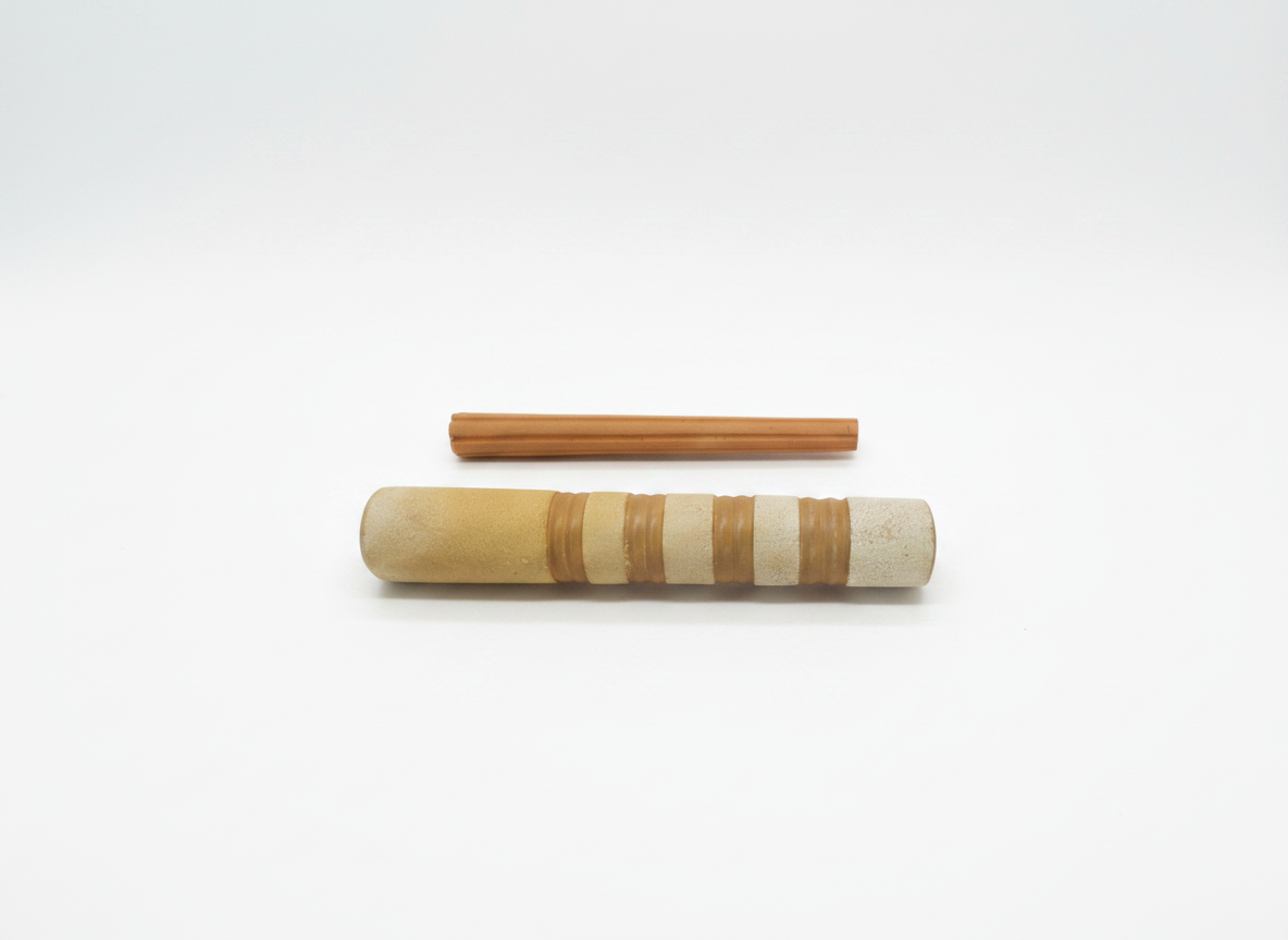 Clay chillum 7 inch beige with brown grip rings side view white seamless