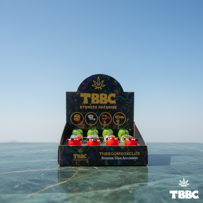 TBBC 16-piece box of assorted coloured borosilicate glass shooter bowls with 14mm and 19mm options on marble and sky background