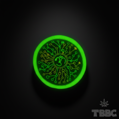 Glow Crushing Bowl Big OM glowing bright under UV light, highlighting the glow-in-dark coating and sacred OM symbol.