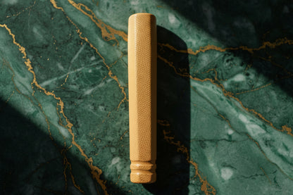 Golden Sadhana Chillum – Natural Textured Handcrafted Smoking Chillum placed under sunlight tbbc studio
