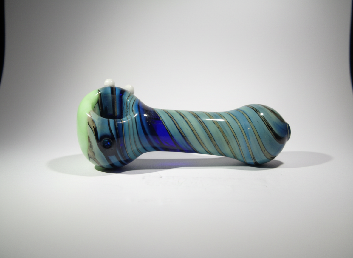 Blue swirl glass hand pipe on white studio background — compact pocket pipe design, buy glass hand pipe India, TBBC