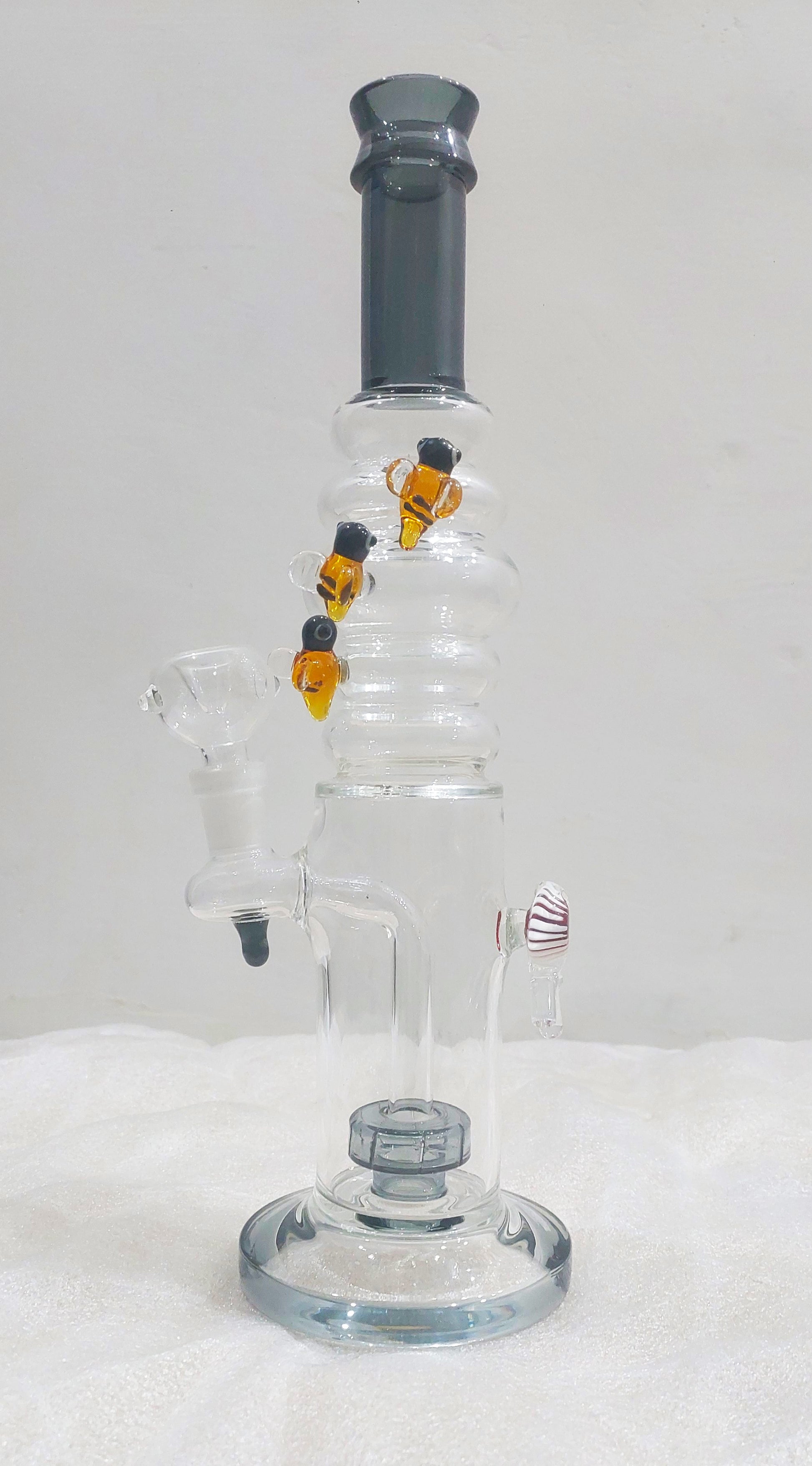 Black Glass water pipe with multiple necks on a white background,Bees on Rings
Watching every bong rip
Heavy Borosil blow handcrafted glass piece with a Fish eye
