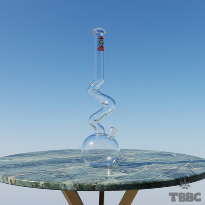 Mushroom Zig Zag 18 inch clear glass bong with winding neck and 14mm joint on marble and sky background
