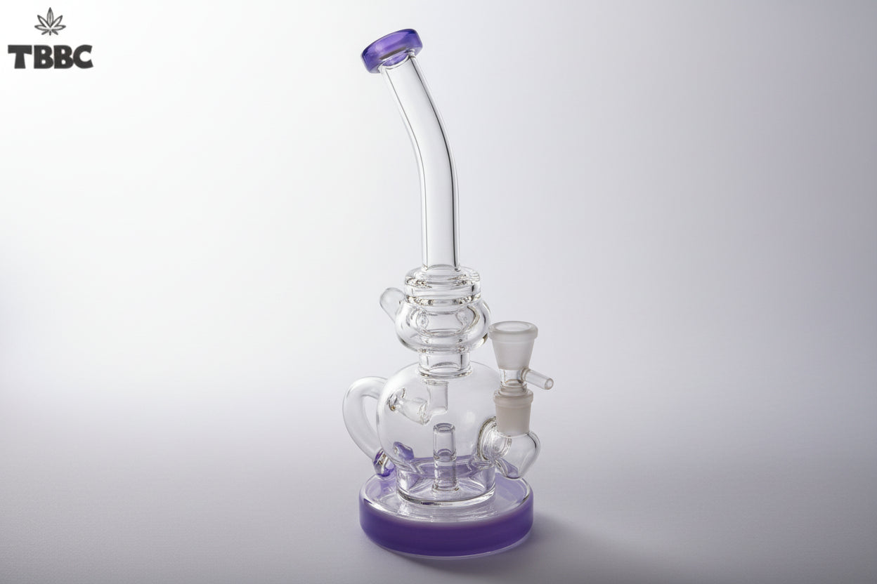 Clear glass water pipe with purple accents on a white background, featuring the TBBC logo. 