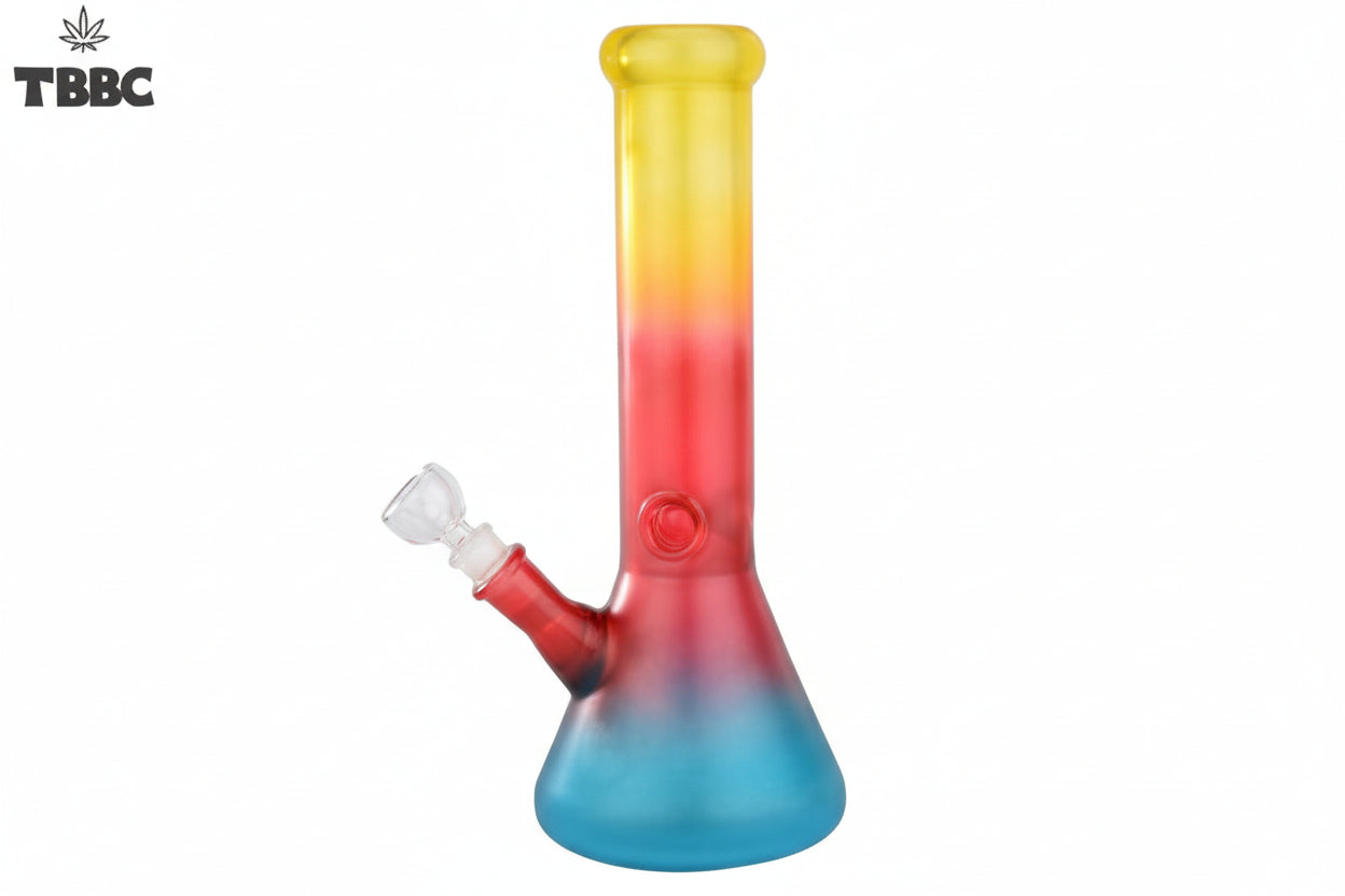 A 12-inch Tri-Colour Flame Glass Bong with a rainbow-colored stripe design and a blue base, featuring a removable bowl and a mouthpiece.