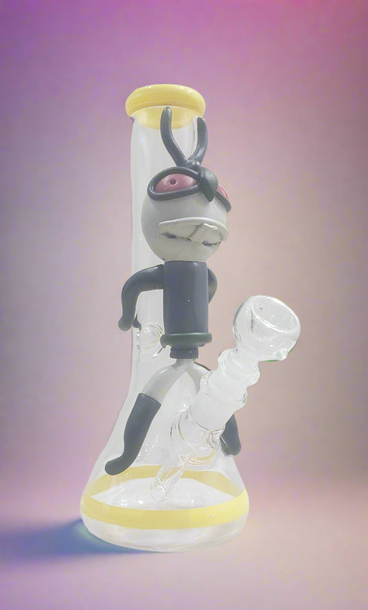 Close-up of a Trippy acid boy glass dick bong with yellow and black parts on a white background, instant delivery in delhi ncr, pan india smoking accessories brand theboomboxclub