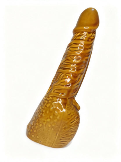 Brown textured object resembling a erotic dick in detail on a white background, erotic novelty Adult Novelty Dick head bong water pipe stoner accessories in INDIA, Dick penis Hand Pipe, Golden Ceramic Gag Gift for genz instant delivery in delhi ncr,  golden novelty hand pipe 12 inches India, large ceramic bachelor party gag gift, premium metallic , gold novelty pipe online, hand carved adult dick head novelty pipe 21+, best bachelor party gag gift India, large golden ceramic pipe for adults, unique adult pe