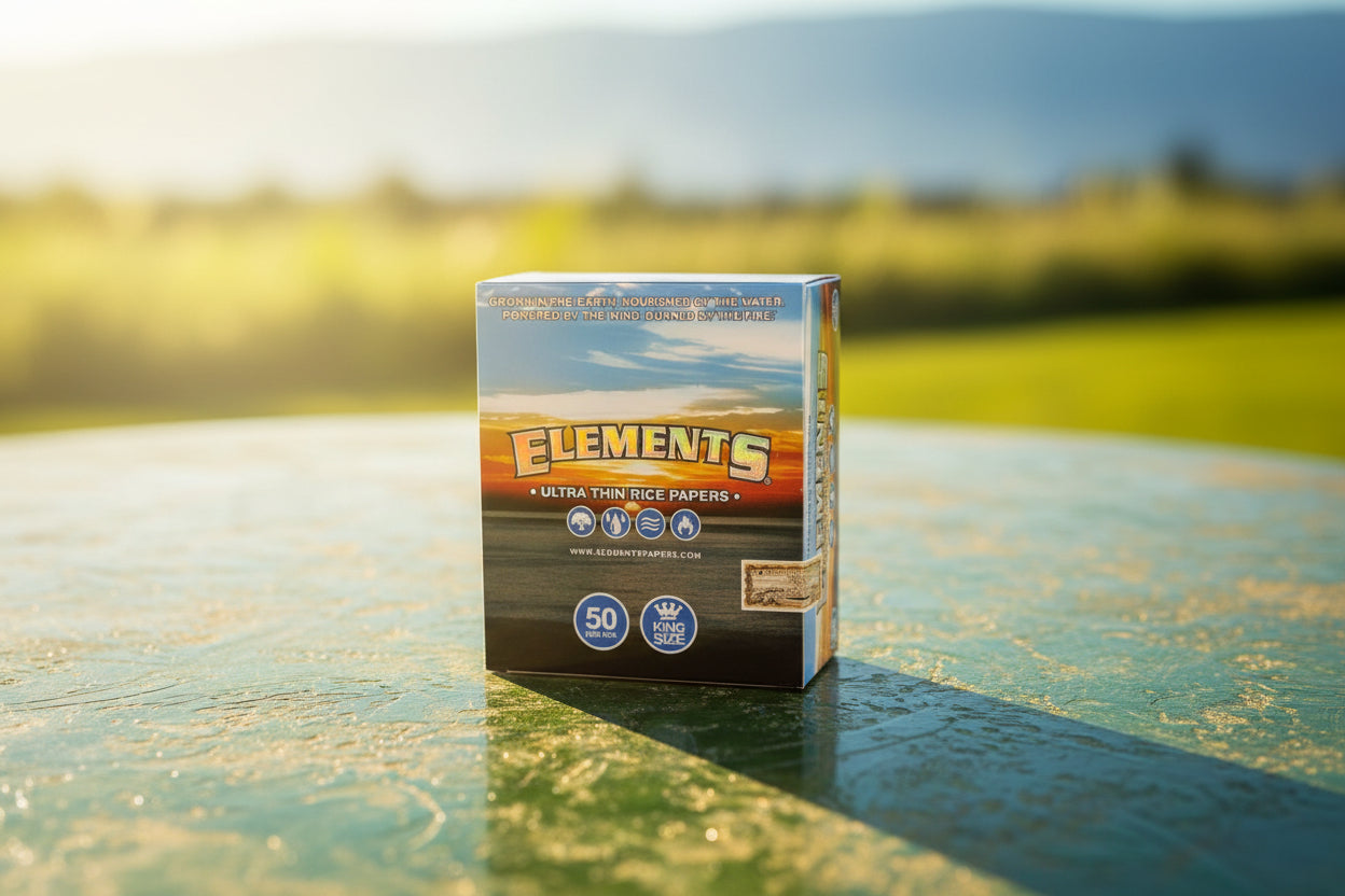 Packaging box of Elements Ultra Thin Paper Booklet with branding and rice imagery, indicating it is a product for rolling cigarettes.