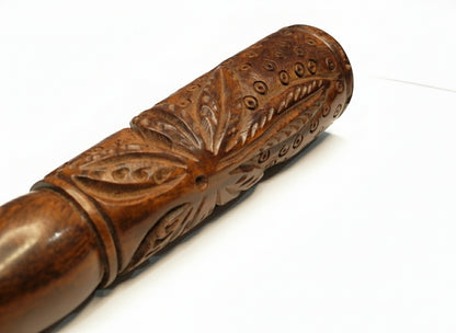 Decorative wooden rolling pin with intricate carvings on a white surface,
rosewood ganja chillum nearby me, top quality sadhu chillum online available at theboomboxclub, 7 inch wooden heavy weed leaf maruijane chillum instant delivery and export