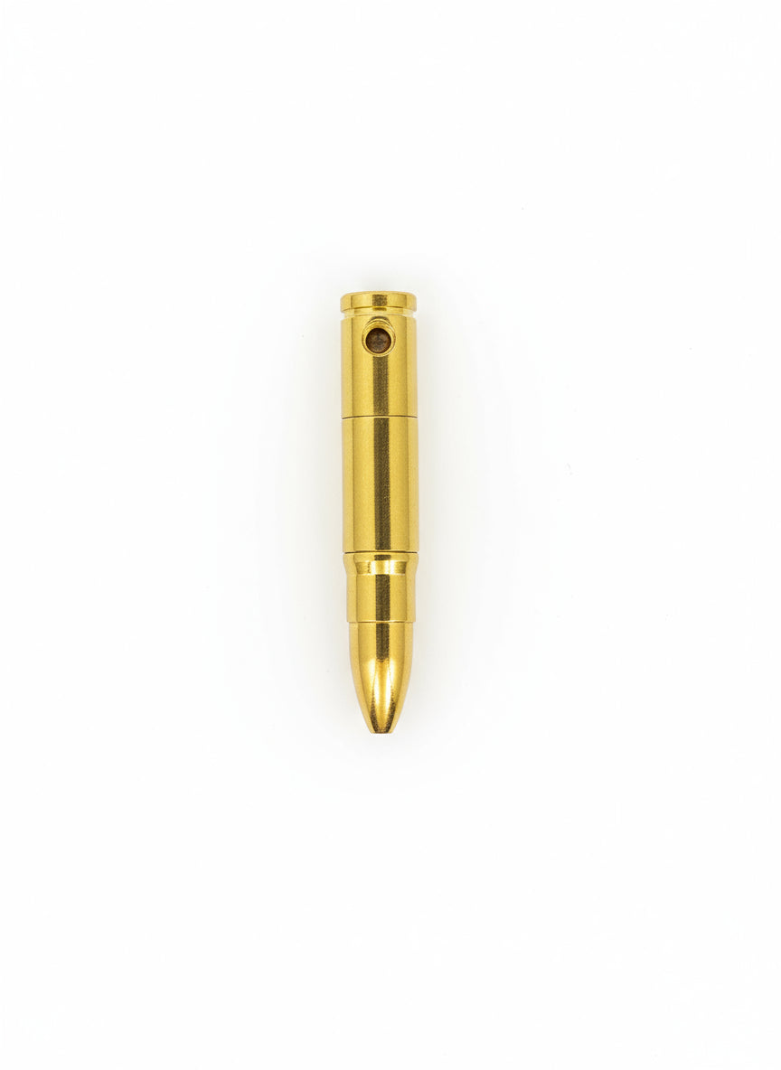 Gold-colored bullet on a gray background, smoking metal golden hand pipes , instant delivery for smoking accessories for stoners, hippie smoking pipes, no tar no heat hand pipes