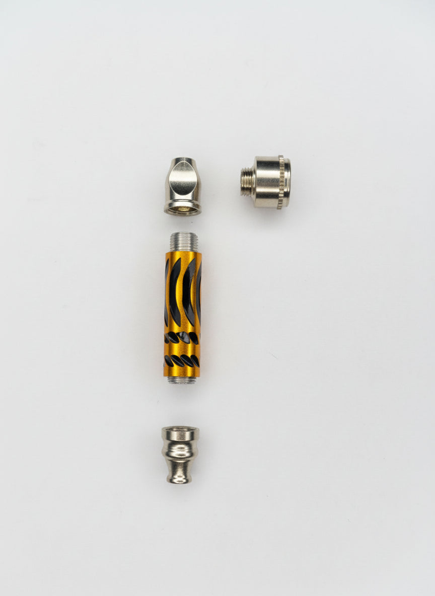 Three metallic components on a gray background, order metal ipes online nearby instant delivery,Glass pipe with metallic toking pipes on a gray background, easy to smoke weed and clean, stoners hippie trippy 420 accessories online