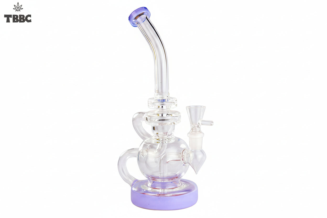 Glass smoking device with green accents on a white background, featuring the TBBC logo. exporter of bongs india, super quality bongs collection online
