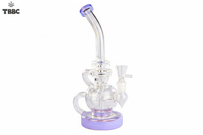 Glass smoking device with green accents on a white background, featuring the TBBC logo. exporter of bongs india, super quality bongs collection online