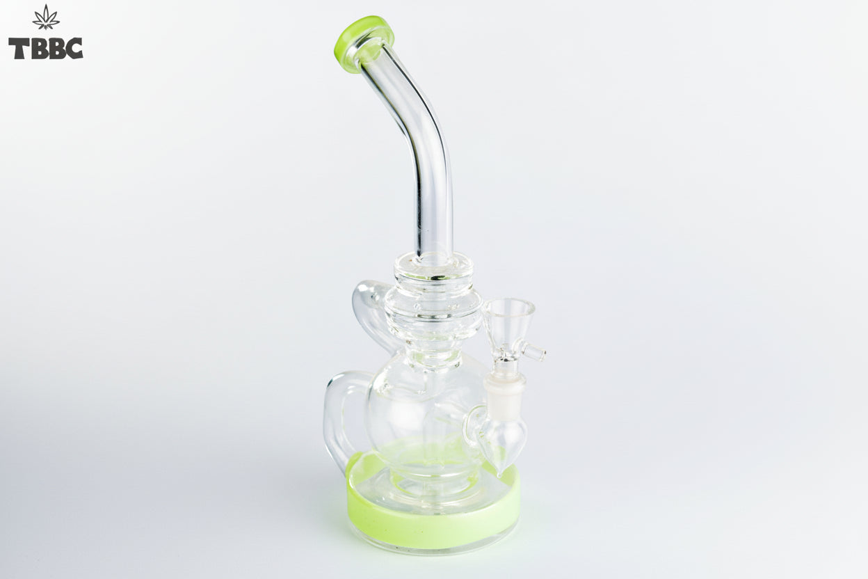 Clear glass water pipe with green accents on a white background, featuring the TBBC logo.