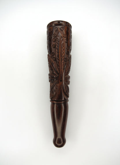 Decorative wooden object with intricate carvings on a white background, rosewood ganja chillum nearby me, top quality sadhu chillum online available at theboomboxclub, 7 inch wooden heavy weed leaf maruijane chillum instant delivery and export