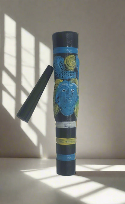 A 7-inch Black Shiva Clay Chillum with a multicolored design, featuring predominantly black with blue and yellow accents, displayed against a white background. clay chillums online instant delivery, hippie stoner weed hash chillums