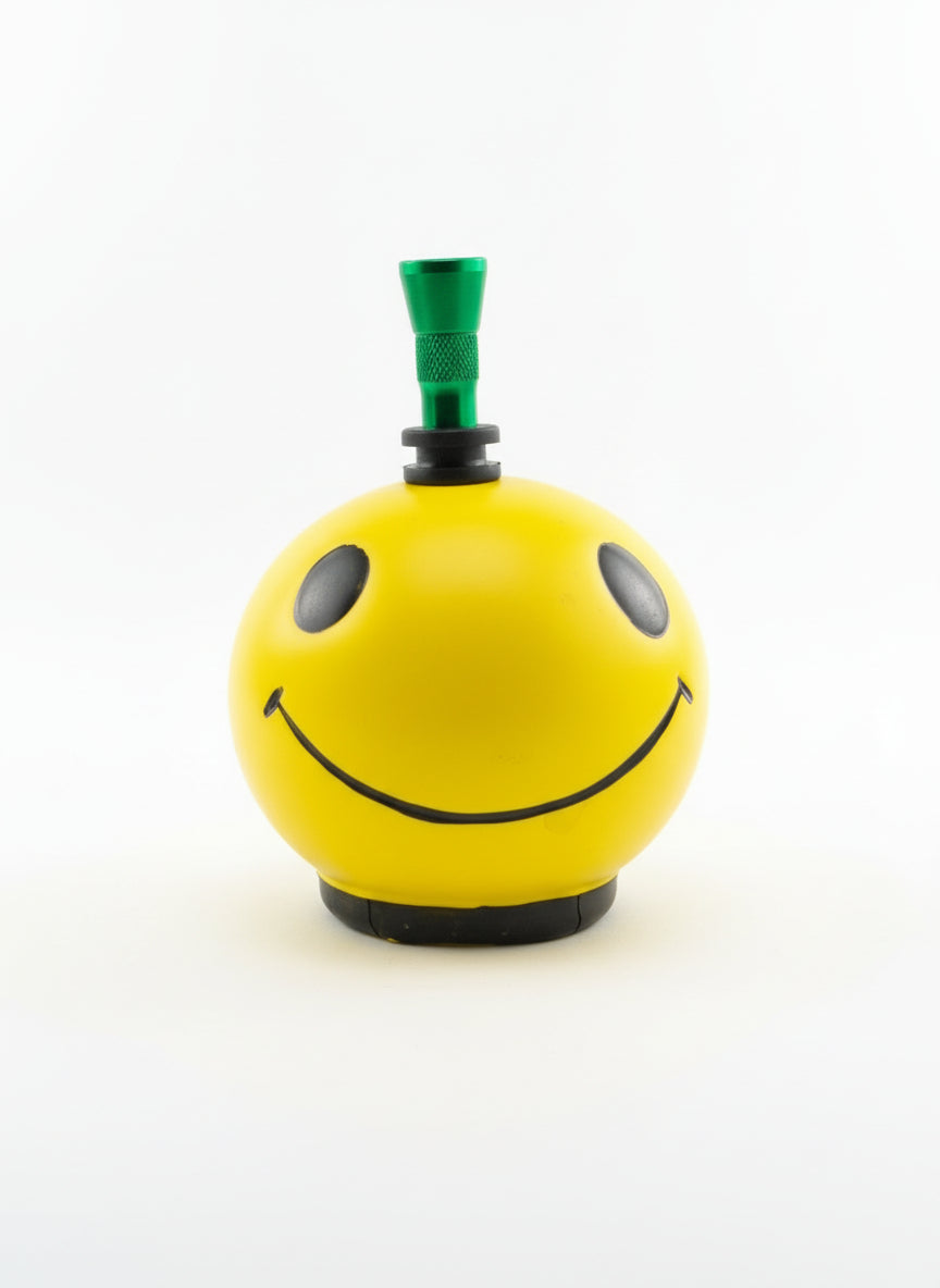 Top view yellow ceramic bong with green metal hitter and rubber grommet seal