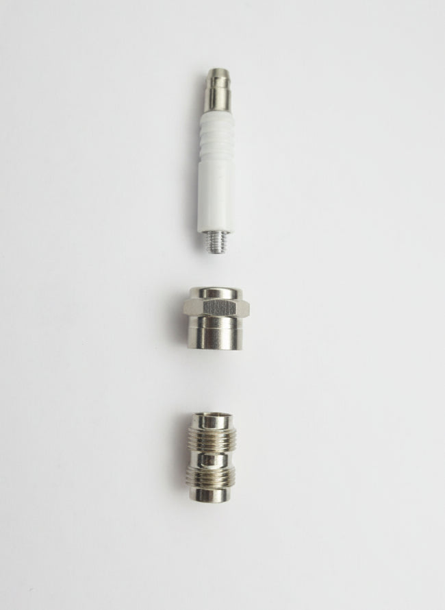 Two metal connectors on a white surface, Spark plug on a light gray background, easy to hide weed smoking pipes online, unique artistic smoking hand pipes near me online instant delivery, best exporter for smoking accessories metal hand pipes