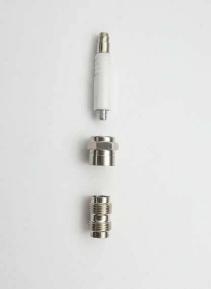 Two metal connectors on a white surface, Spark plug on a light gray background, easy to hide weed smoking pipes online, unique artistic smoking hand pipes near me online instant delivery, best exporter for smoking accessories metal hand pipes
